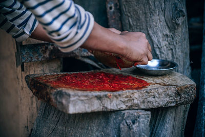 Close-up of man working on wood