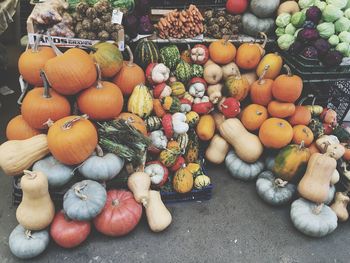 High angle view of pumpkins for sale at market stall