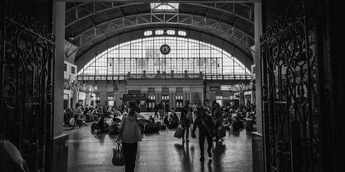 People walking on railroad station