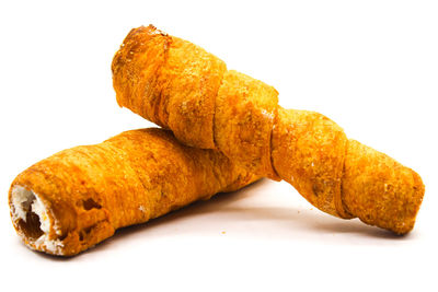 Close-up of burger against white background