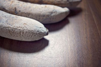 Close-up of frozen bananas on table