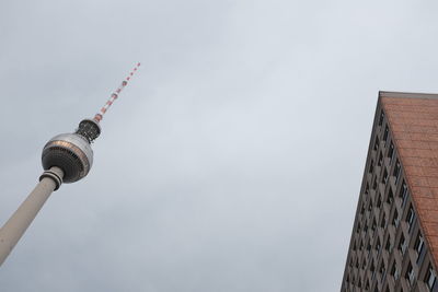 Low angle view of fernsehturm against sky