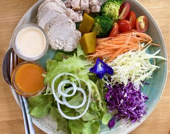 High angle view of chopped vegetables in bowl on table