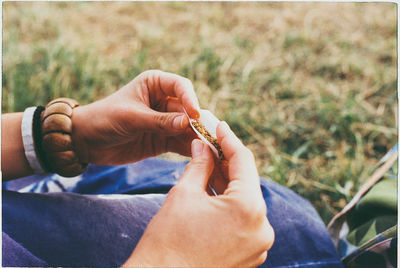 Close-up of hand holding hands