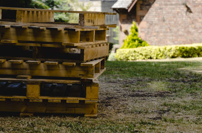 Stack of firewood in field