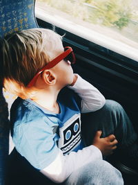 Boy sitting in car