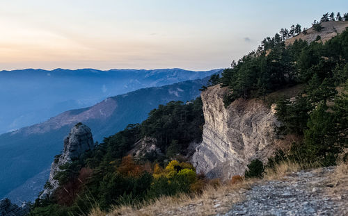 Scenic view of mountains against sky during sunset