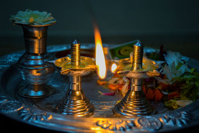 Close-up of diya in temple