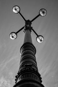 Low angle view of street light against sky