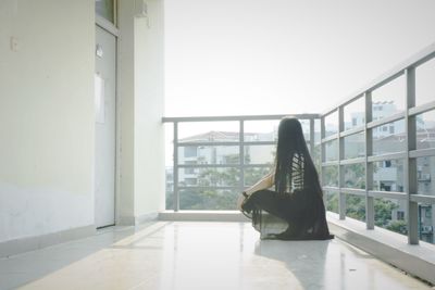 Woman sitting on bench