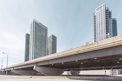 Low angle view of modern buildings against sky