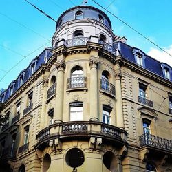 Low angle view of building against blue sky