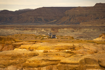 Scenic view of desert against mountain range