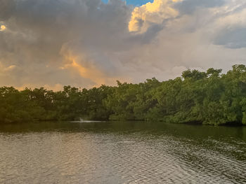 Scenic view of lake against sky during sunset