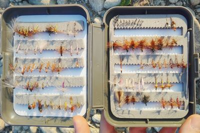 Close-up view of hand made fly fishing fly collection.
