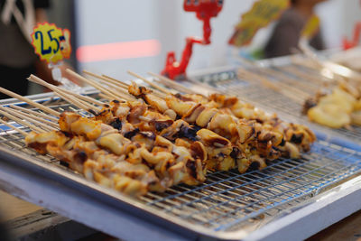 Close-up of meat on barbecue grill