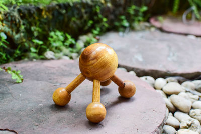 Close-up of wood massage on rock