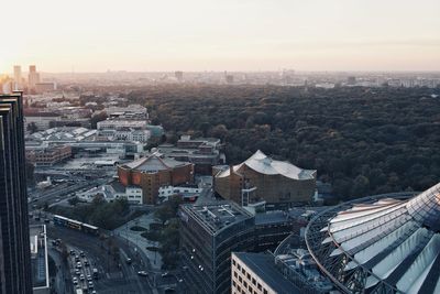 High angle view of city buildings against clear sky