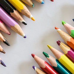 High angle view of colored pencils on table