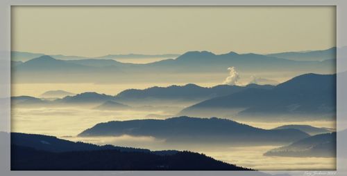 Scenic view of mountains at sunset