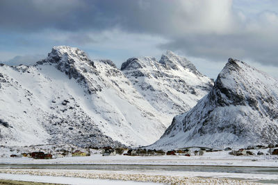 Scenic view of snowcapped mountains against sky