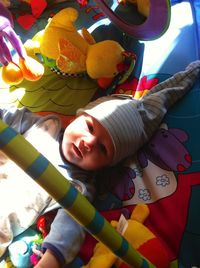 High angle view portrait of cute girl with toy