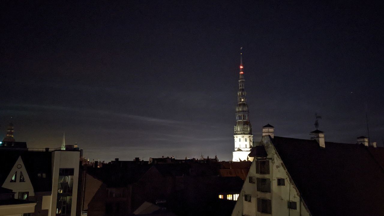 architecture, building exterior, built structure, night, building, sky, tower, city, darkness, evening, dusk, travel destinations, spire, light, no people, nature, communications tower, place of worship, illuminated, cityscape, religion, roof, residential district, outdoors, skyscraper, belief, skyline, city life, communication