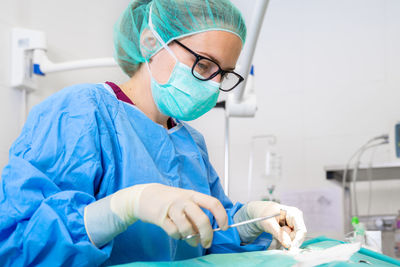 Female surgeon working at hospital