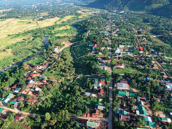 High angle view of townscape and trees in city