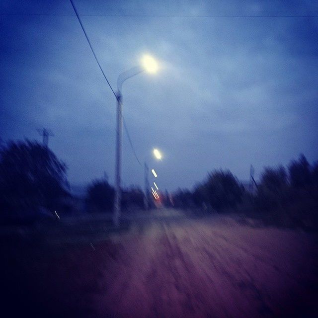 electricity, electricity pylon, power line, fuel and power generation, sky, power supply, technology, connection, cable, street light, dusk, silhouette, landscape, nature, tranquility, low angle view, field, tranquil scene, road, the way forward