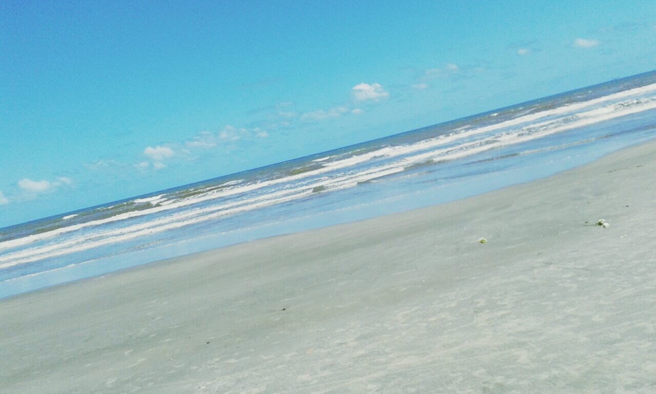 sea, horizon over water, beach, water, sky, shore, scenics, wave, blue, beauty in nature, sand, tranquility, tranquil scene, nature, surf, idyllic, cloud - sky, day, motion, outdoors