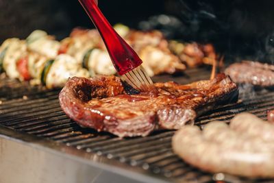 Close-up of meat on barbecue grill