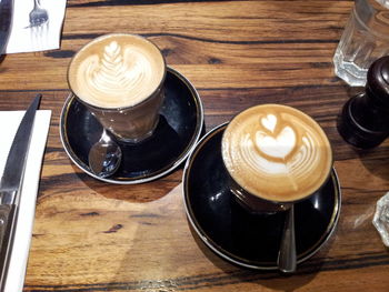 High angle view of coffee cup on table