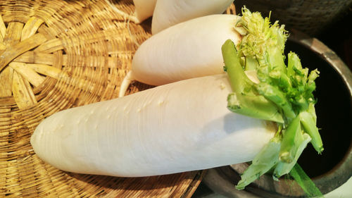 High angle view of vegetables in basket on table