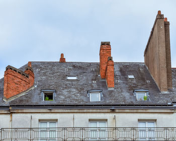 Dormer windows and roof of buildings in nantes, france