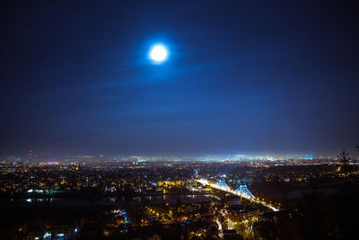 High angle view of illuminated cityscape at night