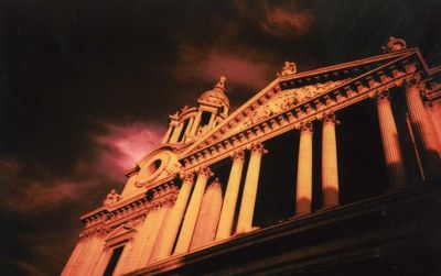 Low angle view of brandenburg gate against sky at night