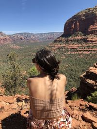 Rear view of woman looking at mountain