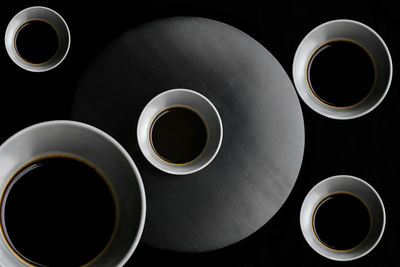 High angle view of black coffee on table