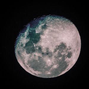 Low angle view of moon against sky at night