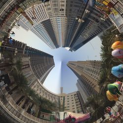 Little planet effect of buildings against clear sky