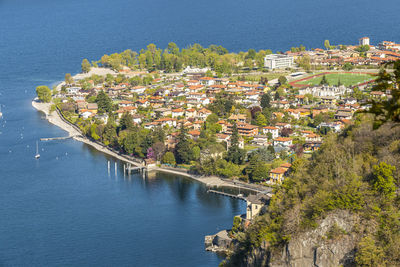 High angle view of river amidst buildings in town