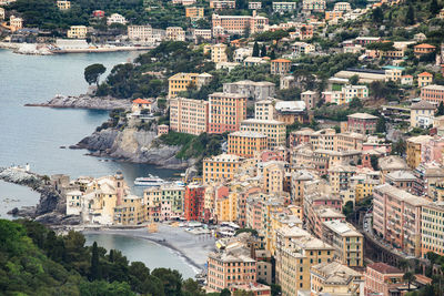 High angle view of buildings by sea at camogli