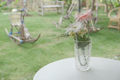 Close-up of flower vase on table