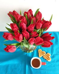 High angle view of red tulips in vase