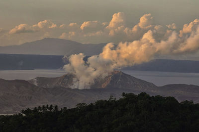 Scenic view of mountains against sky during sunset