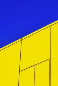 Yellow facade against blue sky