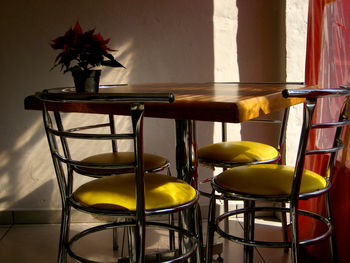 Empty chairs and table at home