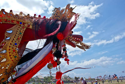 Low angle view of traditional kite against sky .