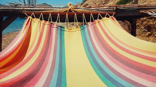 Multi colored flags hanging outdoors